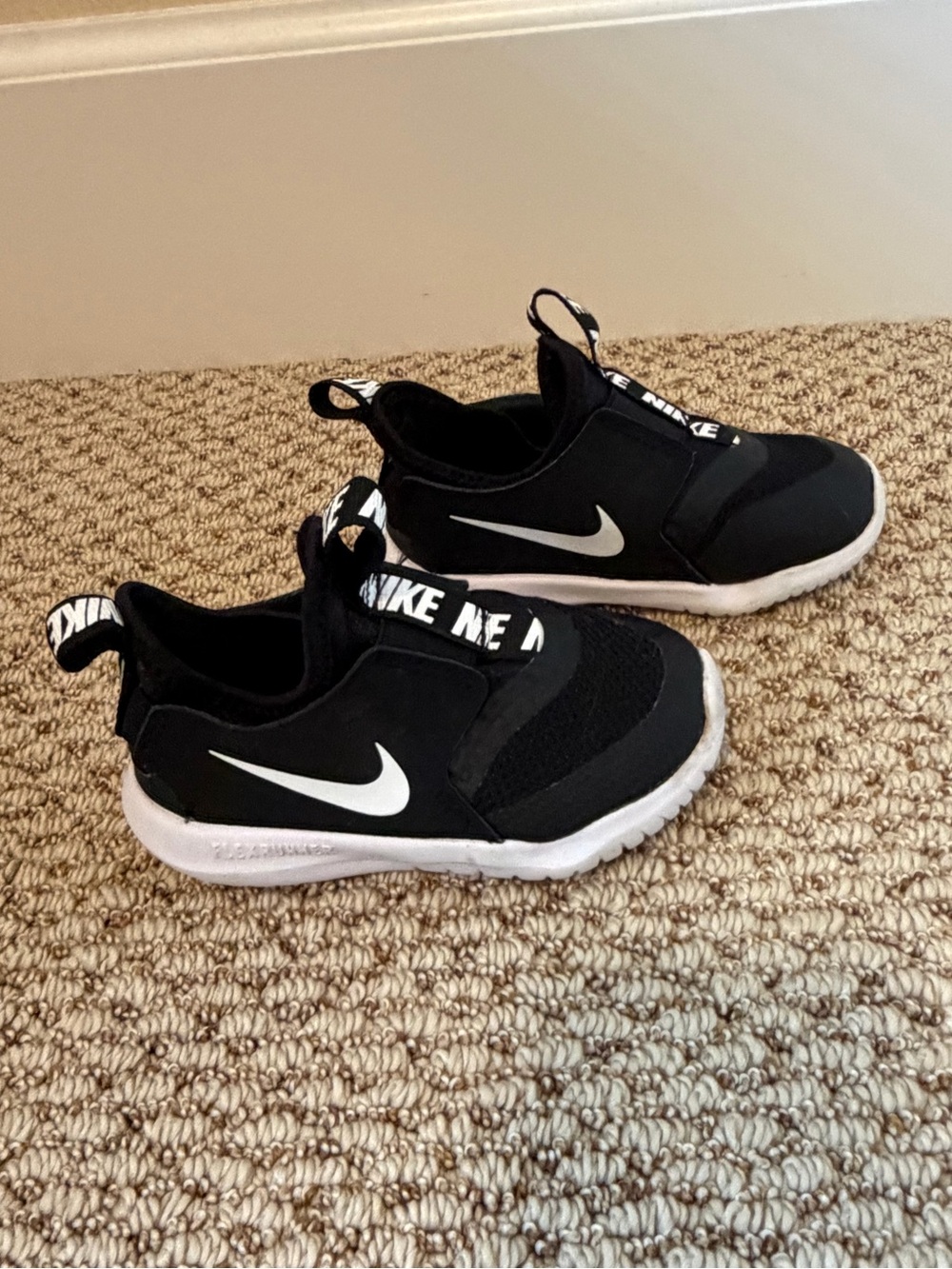 Nike Kids Black and White Slip-On Sneakers